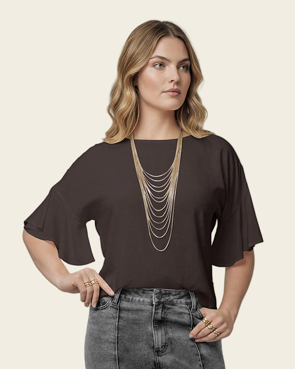 Blusa manga corta con boleros y cuello alto