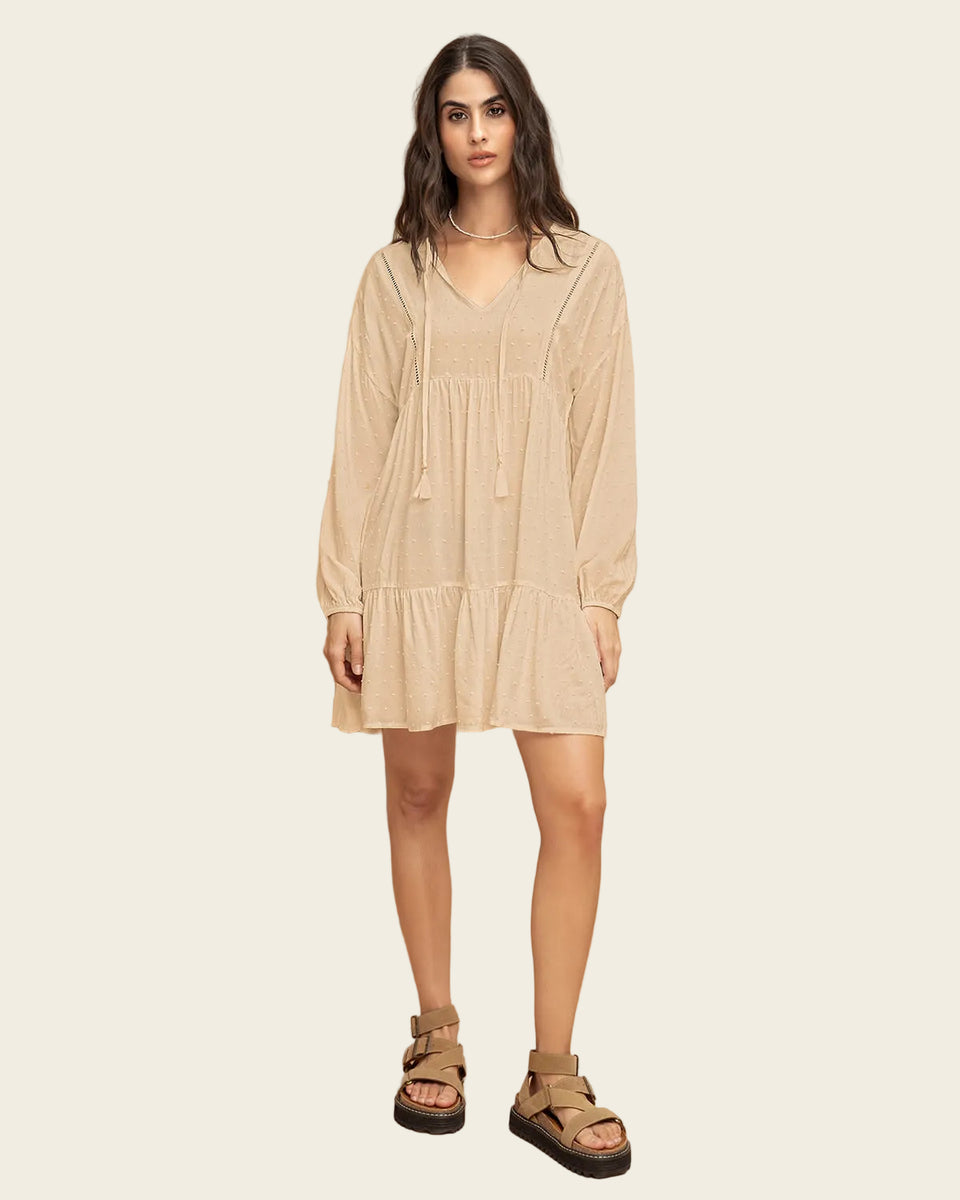 Vestido corto con volumen en mangas