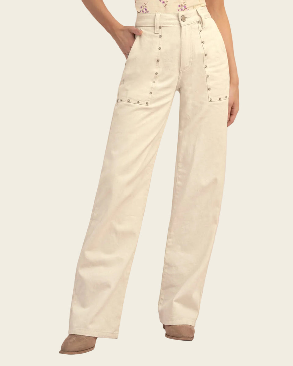 Pantalón bota recta con taches decorativos