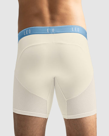 boxer-medio-de-secado-rapido-con-mallas-transpirables-en-microfibra#color_207-blanco-elastico-azul-claro