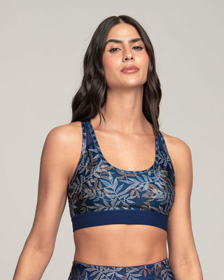 Top deportivo con espalda atlética en material de secado rápido#color_a04-estampado-hojas