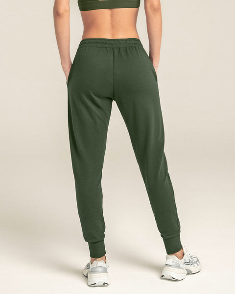 Jogger deportivo de silueta amplia con bolsillos#color_249-verde-oscuro