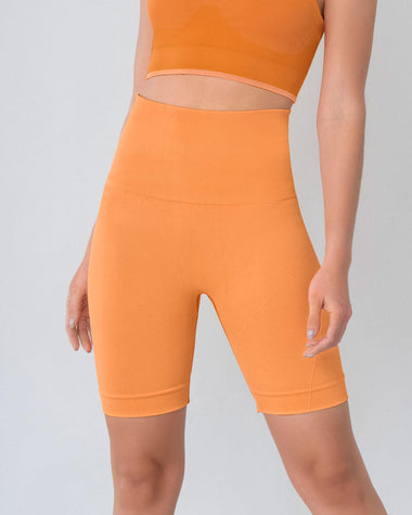 Short ciclista sin costuras control moderado en abdomen y muslos#color_203-naranja