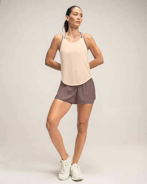 Blusa deportiva de silueta amplia sin mangas#color_815-marfil