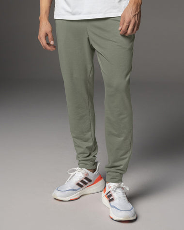 Jogger deportivo estilo sudadera con bolsillos laterales funcionales#color_198-verde-medio