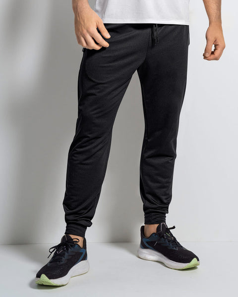 Jogger deportivo ultrasuave al tacto con bolsillos laterales#color_700-negro