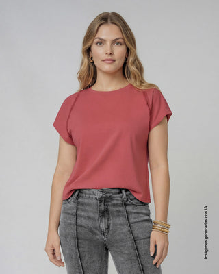 Blusa con boleros en manga elaborada en tela tipo ojalillo#color_311-rosado-claro