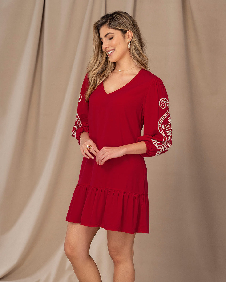 Vestido corto con estampado en mangas