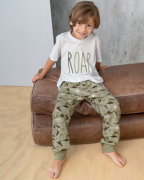 Pantalón de pijama infantil unisex con estampado continuo#color_967-estampado-dinosaurios